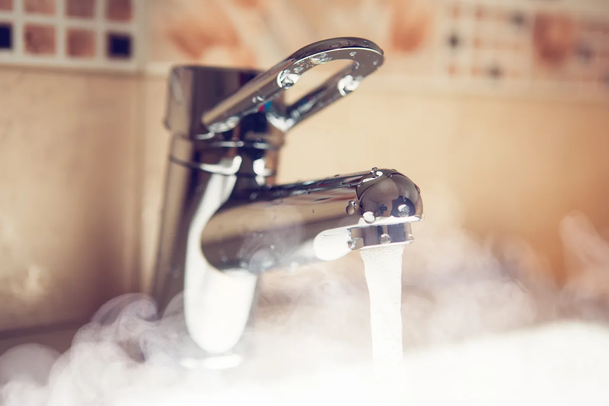 Water tap with hot water steam