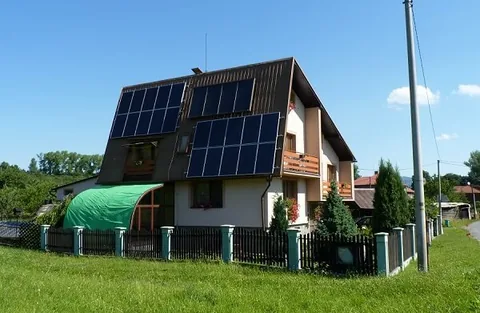 house with solar hot water heater
